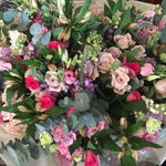 A beautiful bouquet of classic country flowers in shades of pink and cream including Sweetheart Roses, freesias, stocks, alstromeria and finished with eucalyptus. Hand tied, aqua packed and presented in a gift bag.